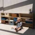 Nofred Birch Kiddo Shelving with a kid in the front