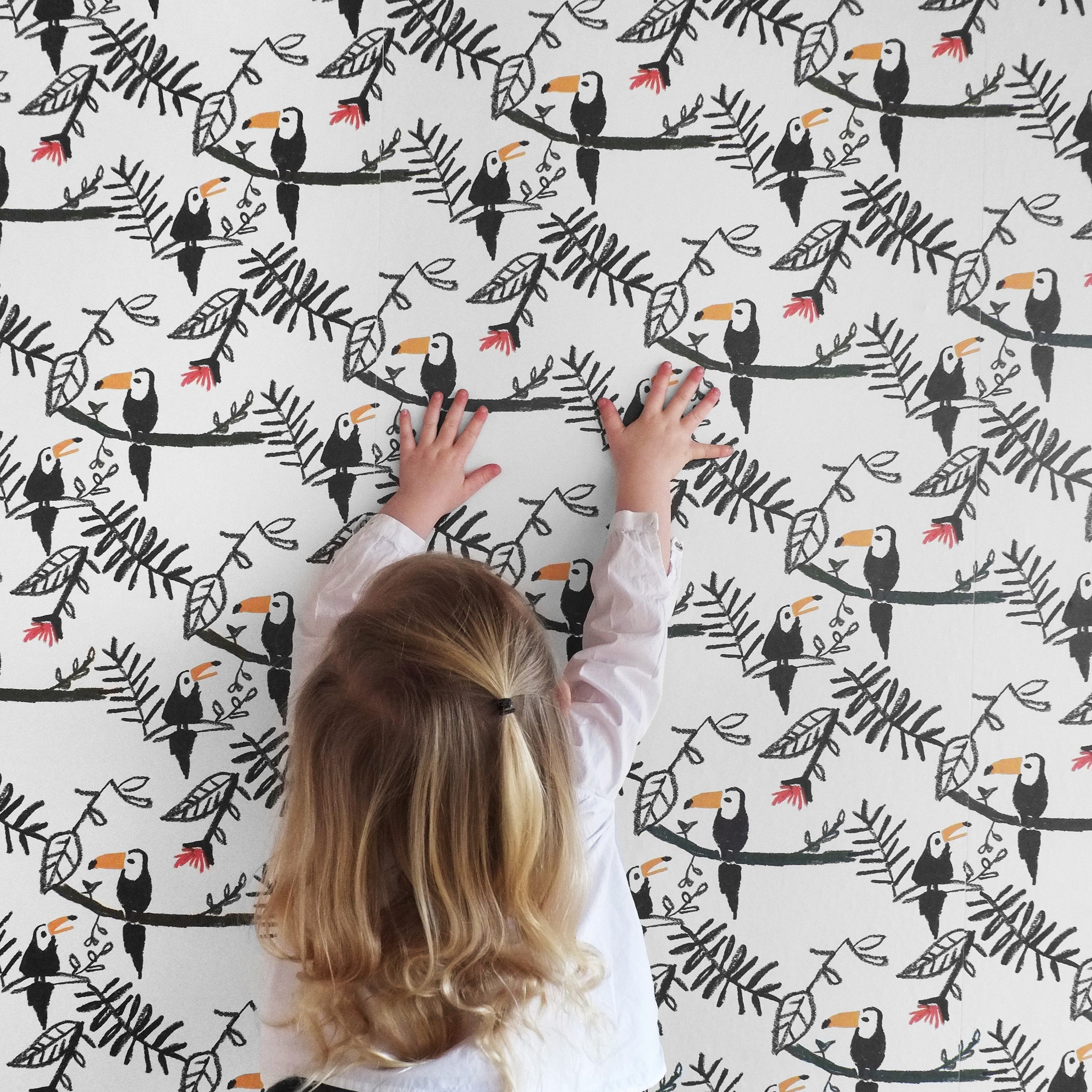 Child in front of Nofred Toucan Kids Wallpaper 