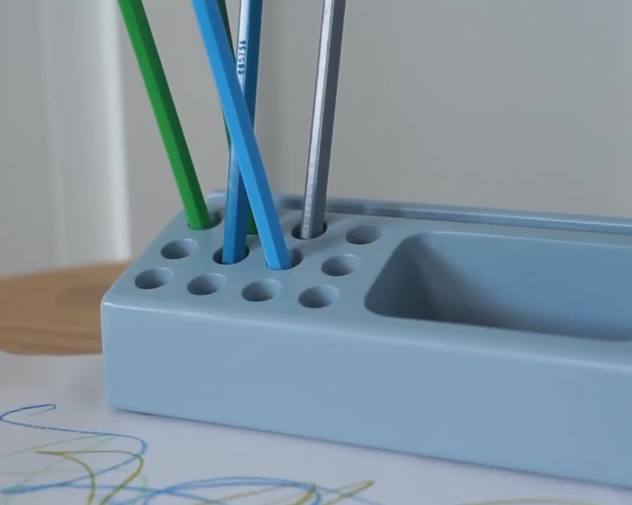 penholder in blue close up