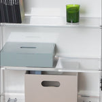 Kiddo Tool Box in Olive Green and Kiddo Box in Beige on a shelf