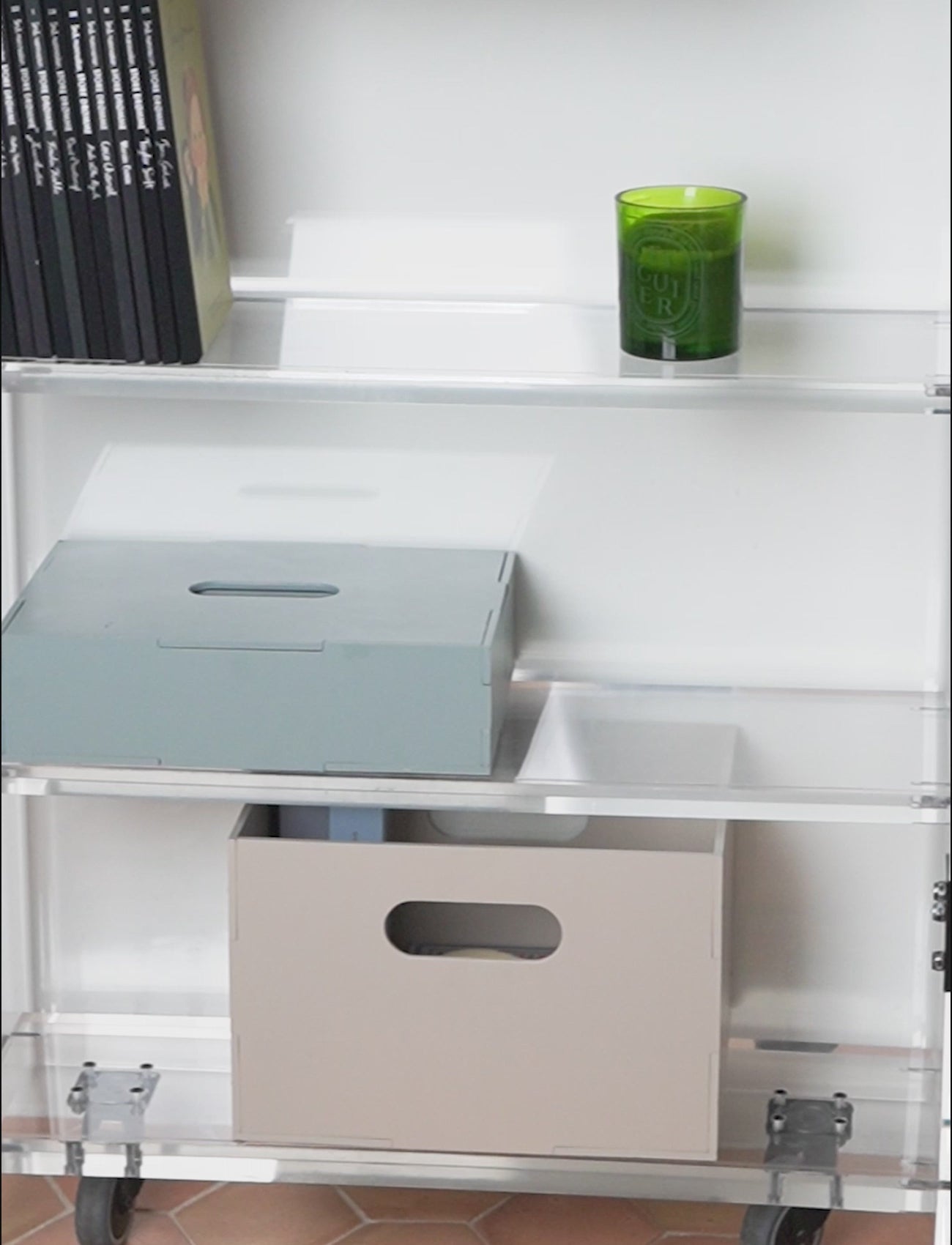 Kiddo Tool Box in Olive Green and Kiddo Box in Beige on a shelf